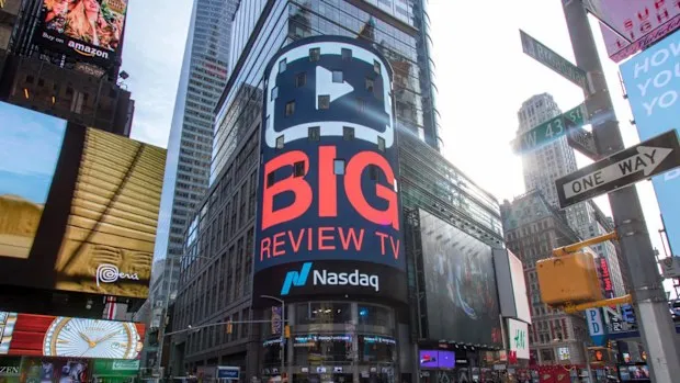 Big Review TV advertising screen on a Times Square building in New York